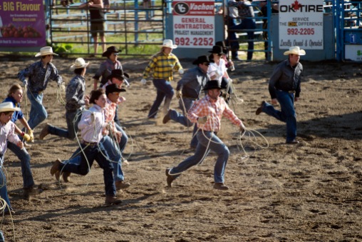 Running to rope them some cows
